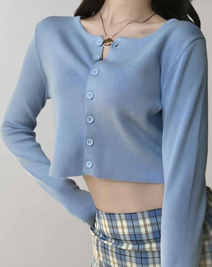 Mikaela  - Unifarbenes Cropped Top mit langen Ärmeln, Rundhalsausschnitt und Knopfleiste